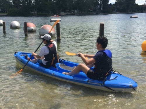 Two boys in a kayak
