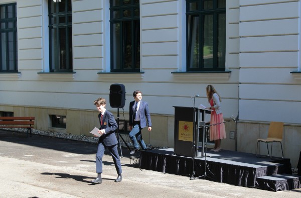 Male student receiving award at AMADEUS Vienna